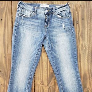 Dark wash denim mid rise skinny jeans